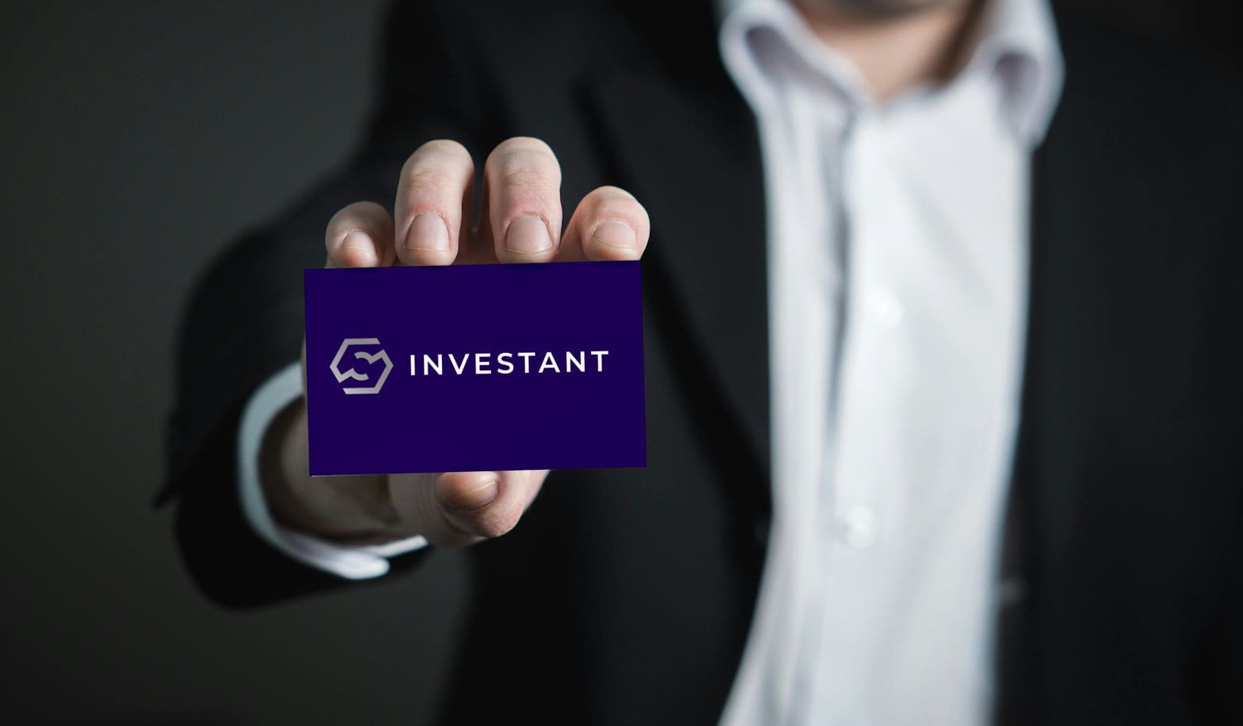 investant-man-with-investant-business-card-stock-photo.jpg