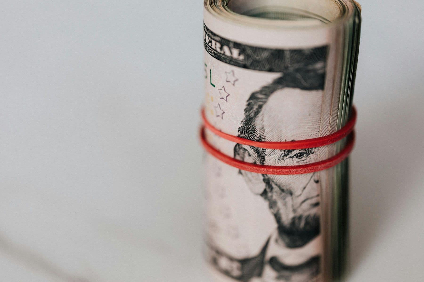 investant-money-roll-lincoln-face-wrapped.jpg
